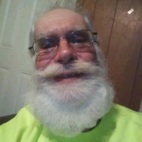 Steve beneath 's photo