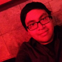 Max eats Tuna's photo